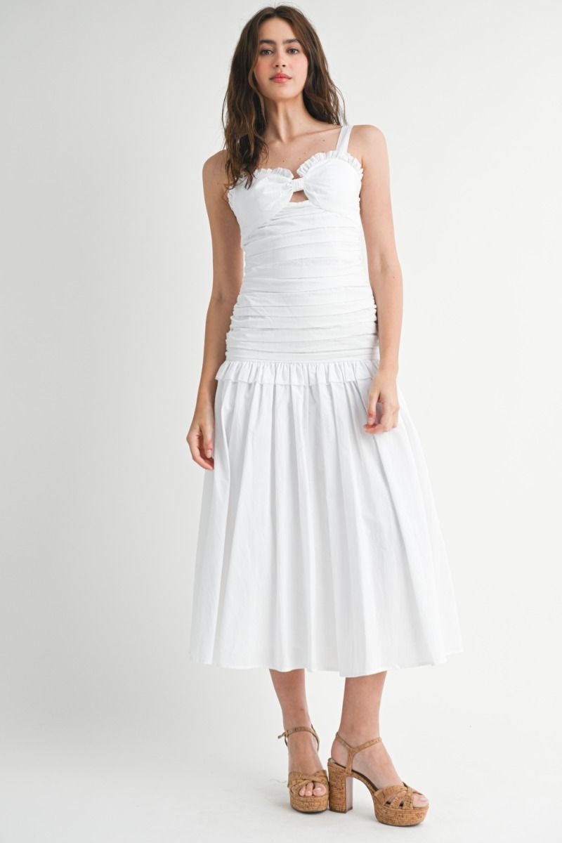 Solid adjustable strap sweetheart neckline ruched bodice low waist front cut out and ruffle trim detail midi dress.