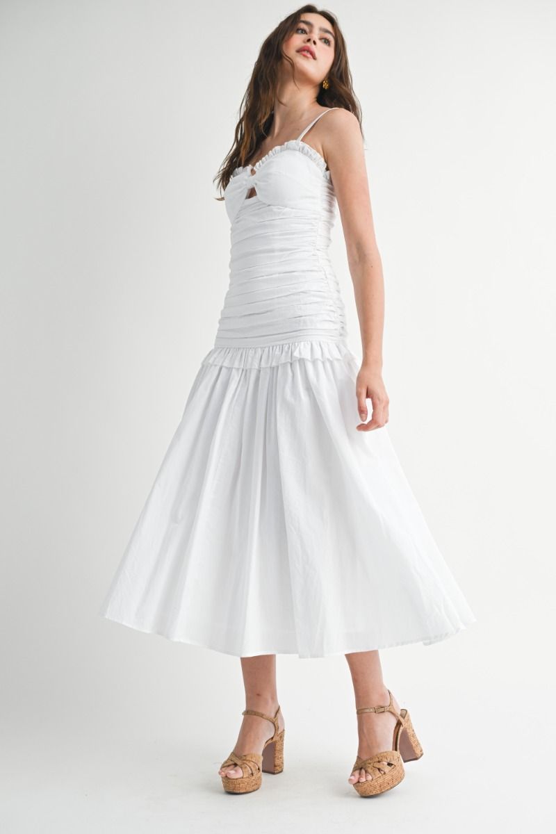 Solid adjustable strap sweetheart neckline ruched bodice low waist front cut out and ruffle trim detail midi dress.