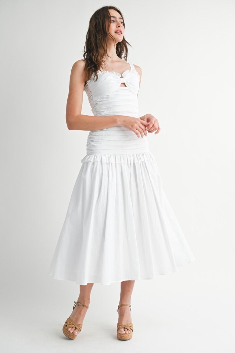 Solid adjustable strap sweetheart neckline ruched bodice low waist front cut out and ruffle trim detail midi dress.