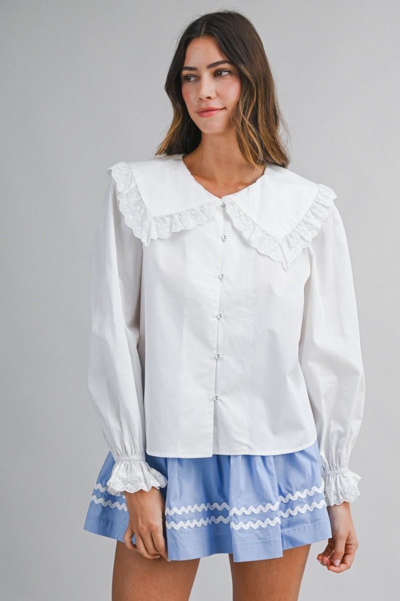 Solid long-sleeve blouse featuring an oversized sailor-style collar with scalloped eyelet lace trim