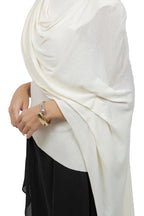 KNITTED SLEEVLESS TOP WITH ASYMMETRICAL MESH CAPE SELF