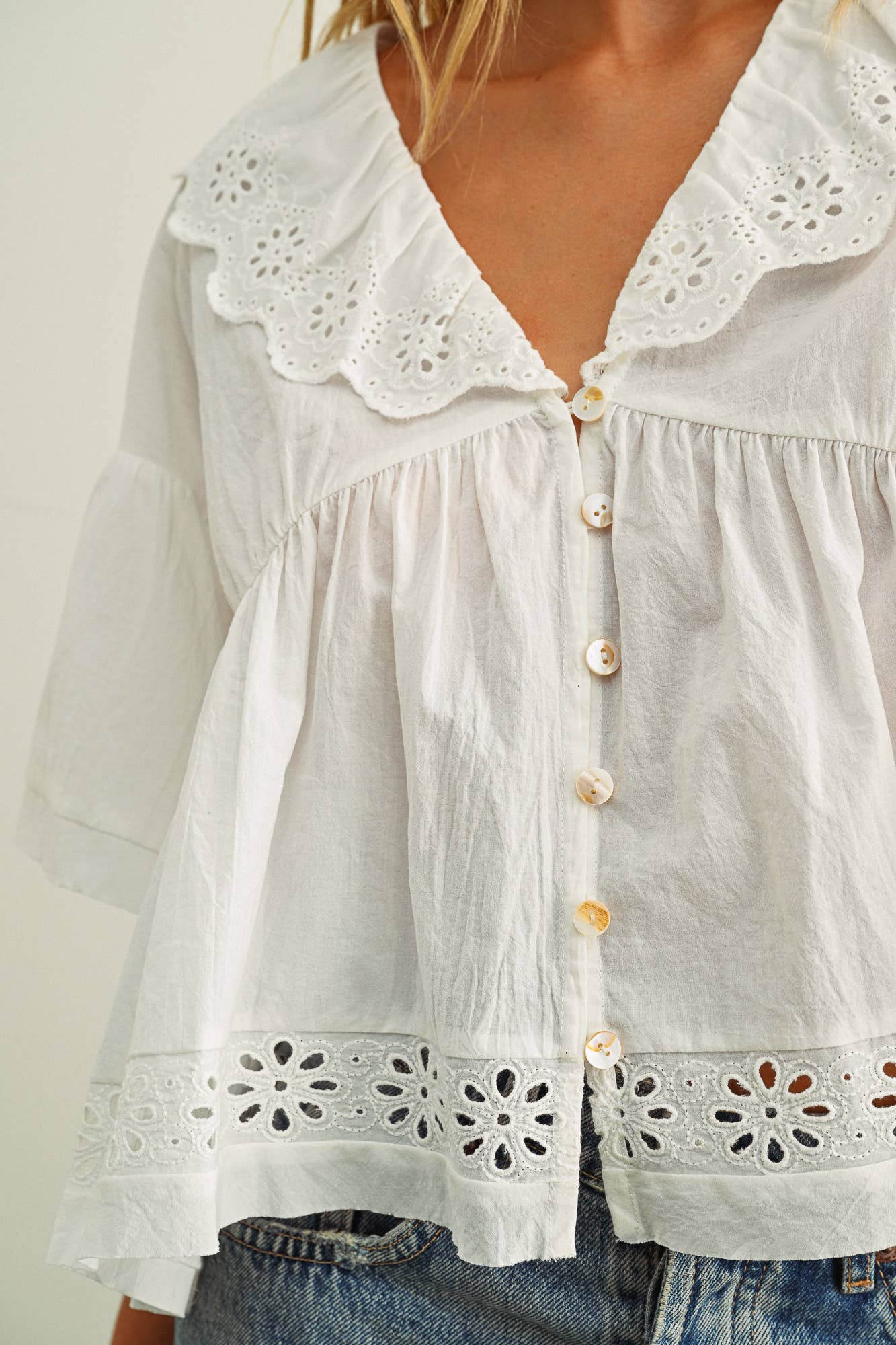 EYELET  RUFFLED BLOUSE
