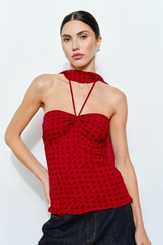 red and black polka dot print top