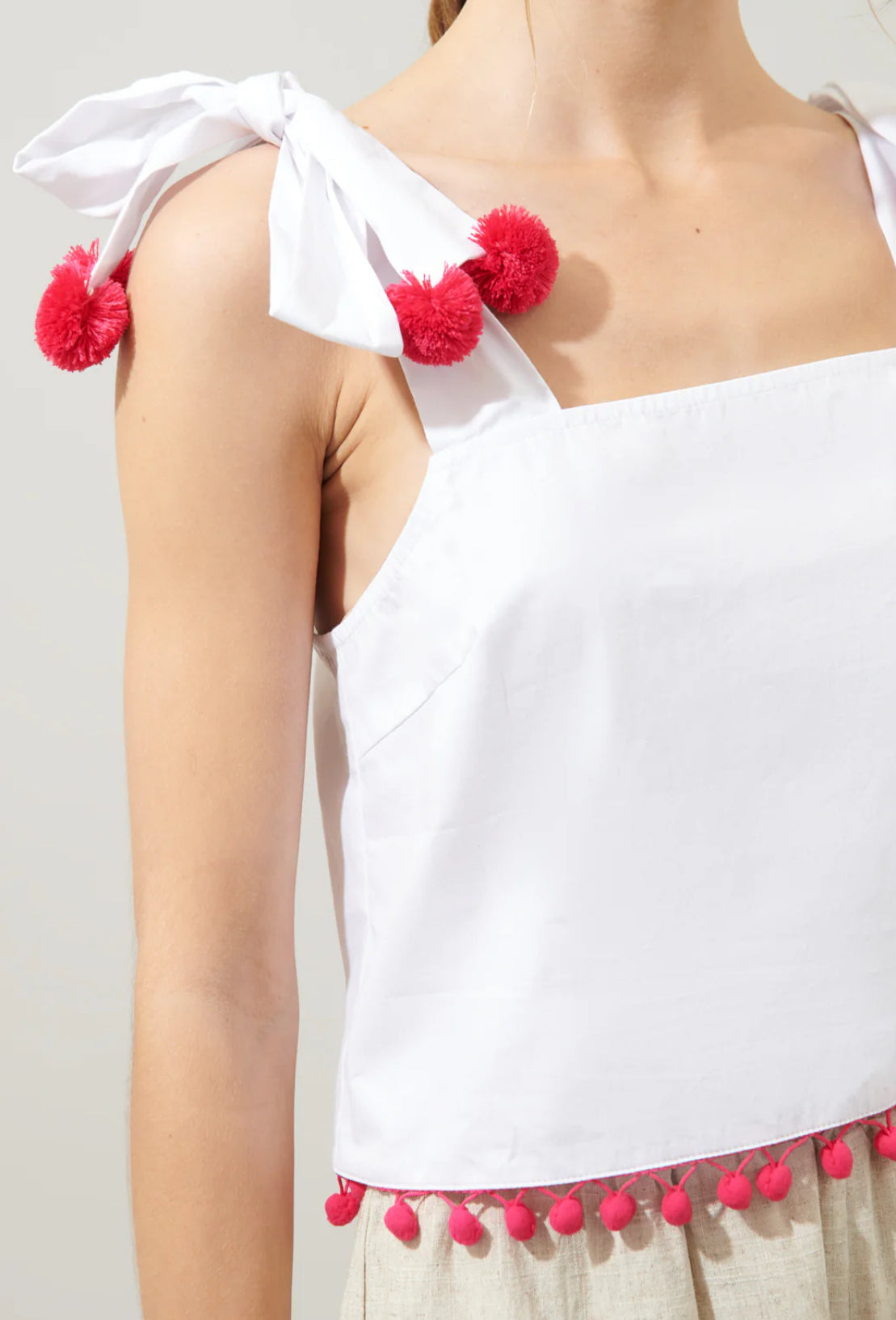 Milagro Tie Strap Cherry Pom Pom Crop Top