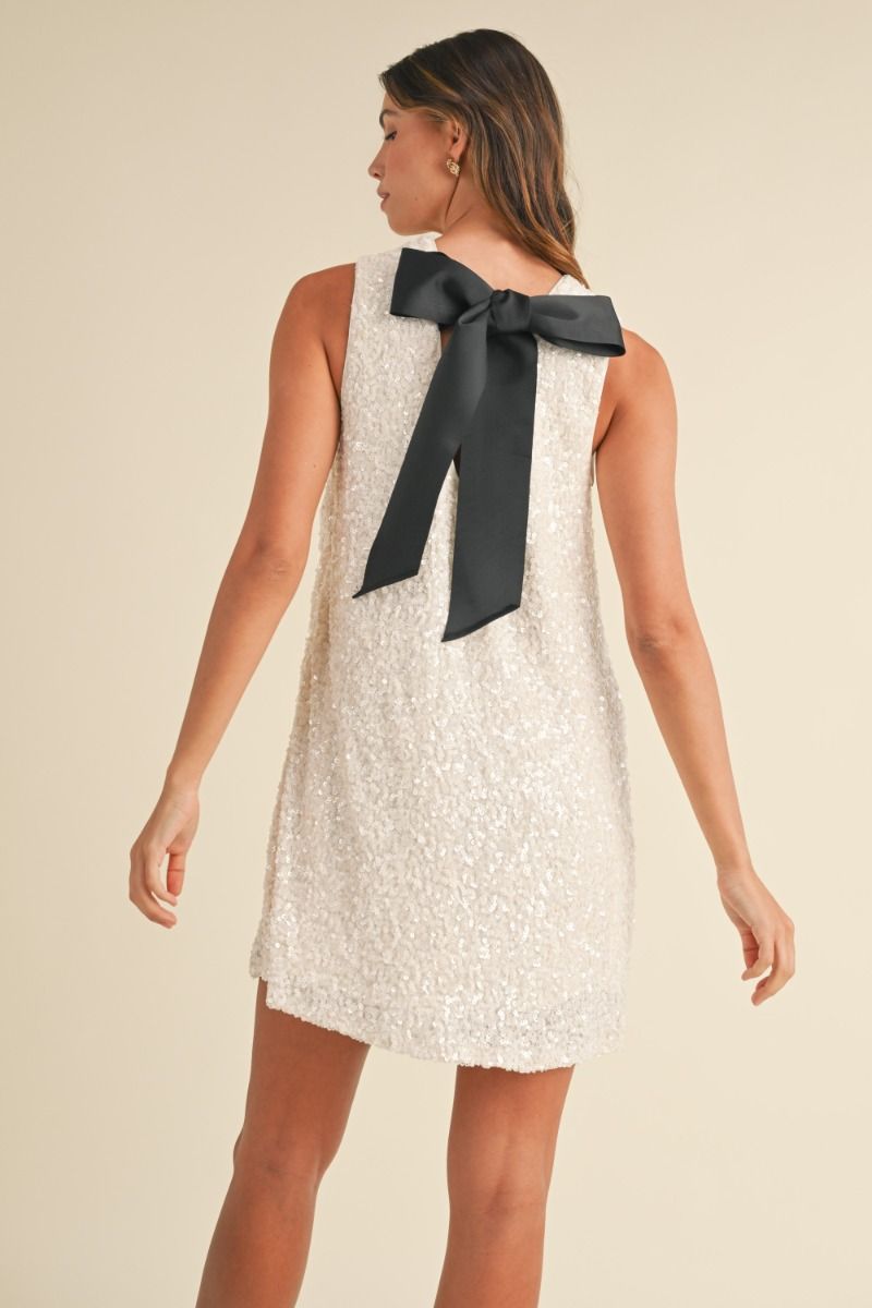 Sleeveless sequin shift mini dress with back satin tie detail