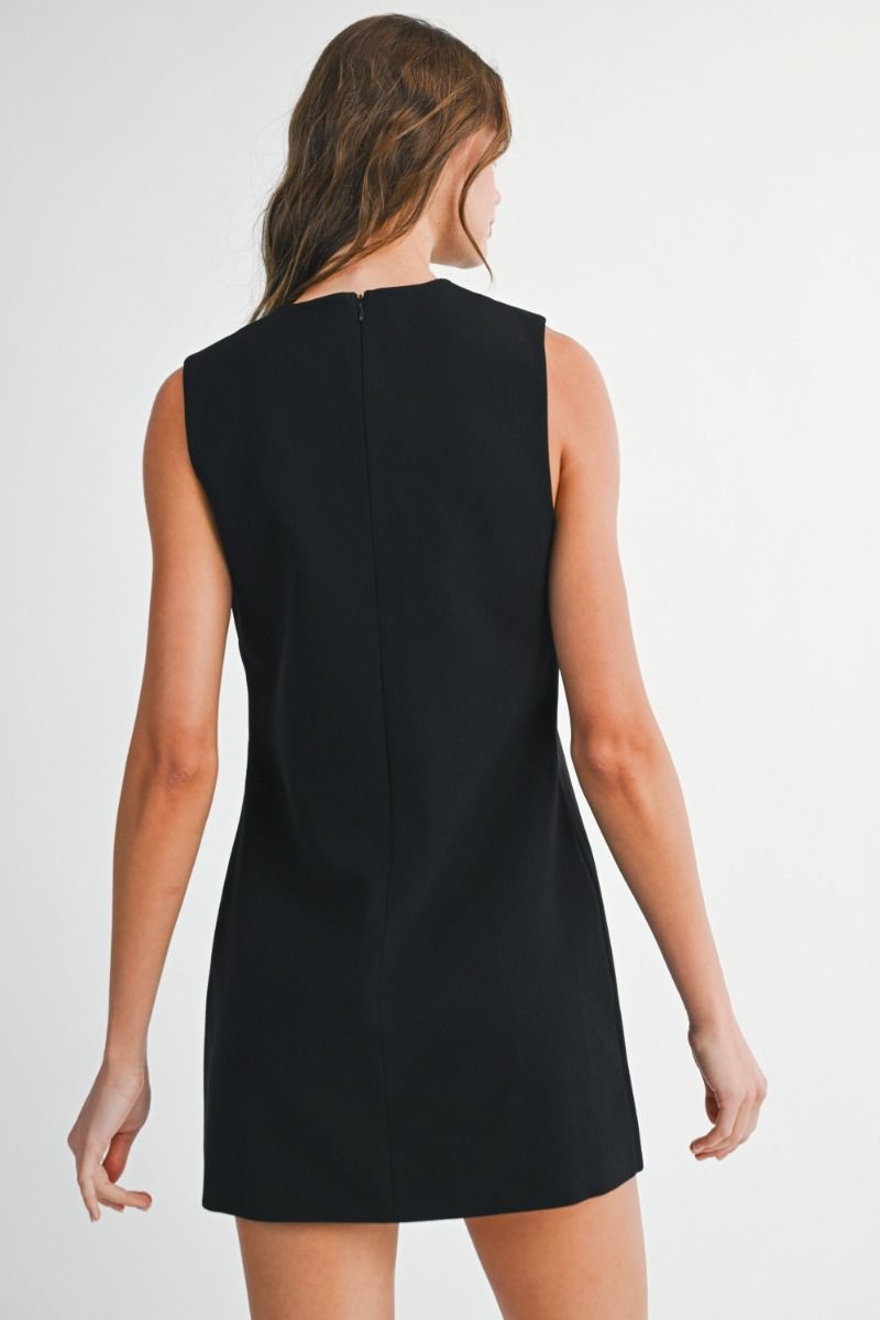 Sleeveless mini dress with round neckline and straight silhouette.